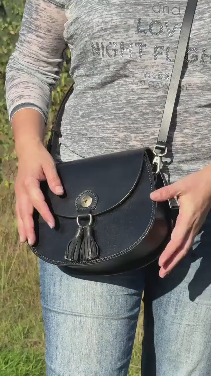 Handmade black leather crossbody bag with brass hardware
